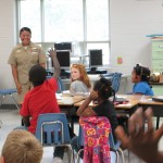 SHC Angela Zamora (standing), US Fleet Forces Command, visited Beth Kelly’s third- grade classroom at Woodstock Elementary on Constitution Day